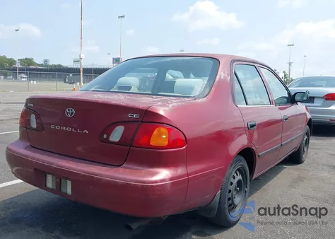 1999 Toyota Corolla Ce из США, поврежденный, VIN 2T1BR12E1XC244432